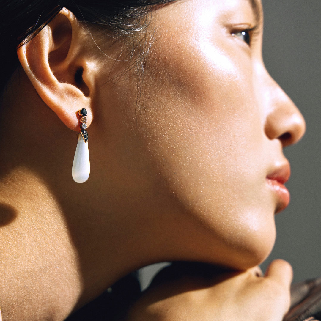 Side profile of a woman with sun reflecting on her face